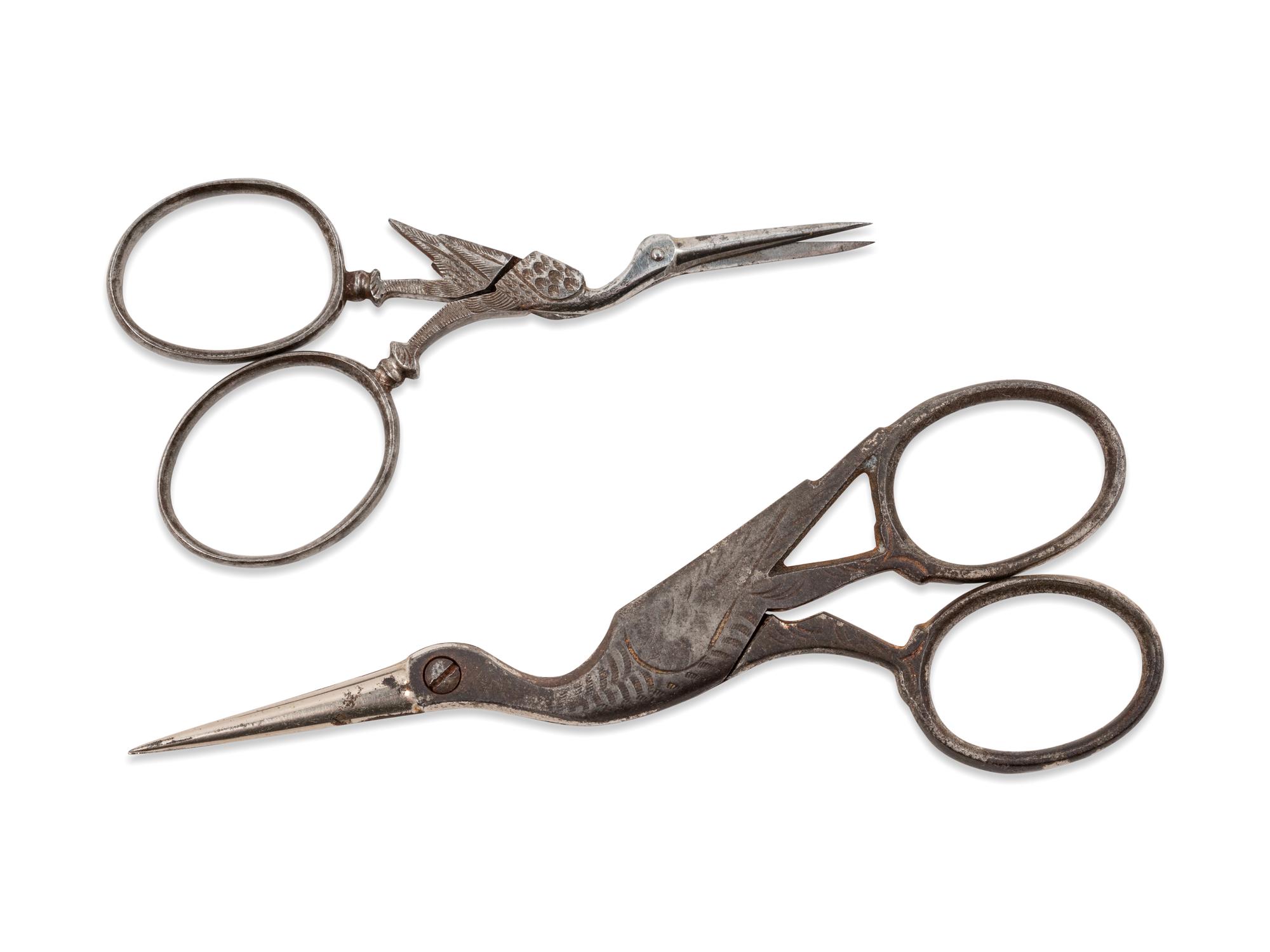 Two Pairs of Continental Steel Bird-Form Needlework Scissors in a Leather Case