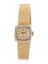 OMEGA, RETAILED BY TIFFANY & CO., 14K YELLOW GOLD AND DIAMOND WATCH