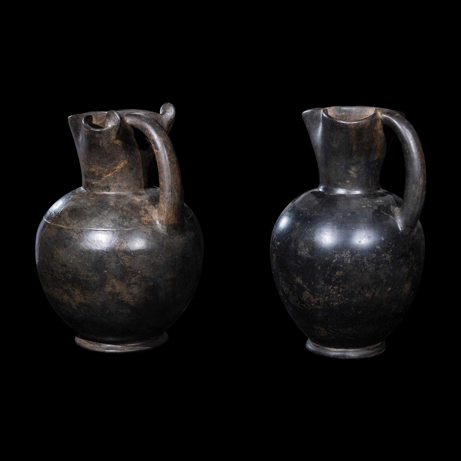Two Etruscan Bucchero Oinochoai