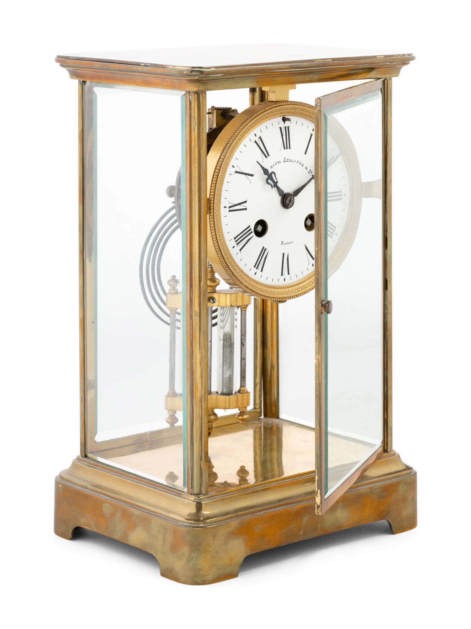 A Continental Brass Regulator Clock Retailed by Bigelow Kennard and Co.
