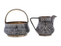 A Russian Niello Inlaid Silver Four-Piece Serving Set