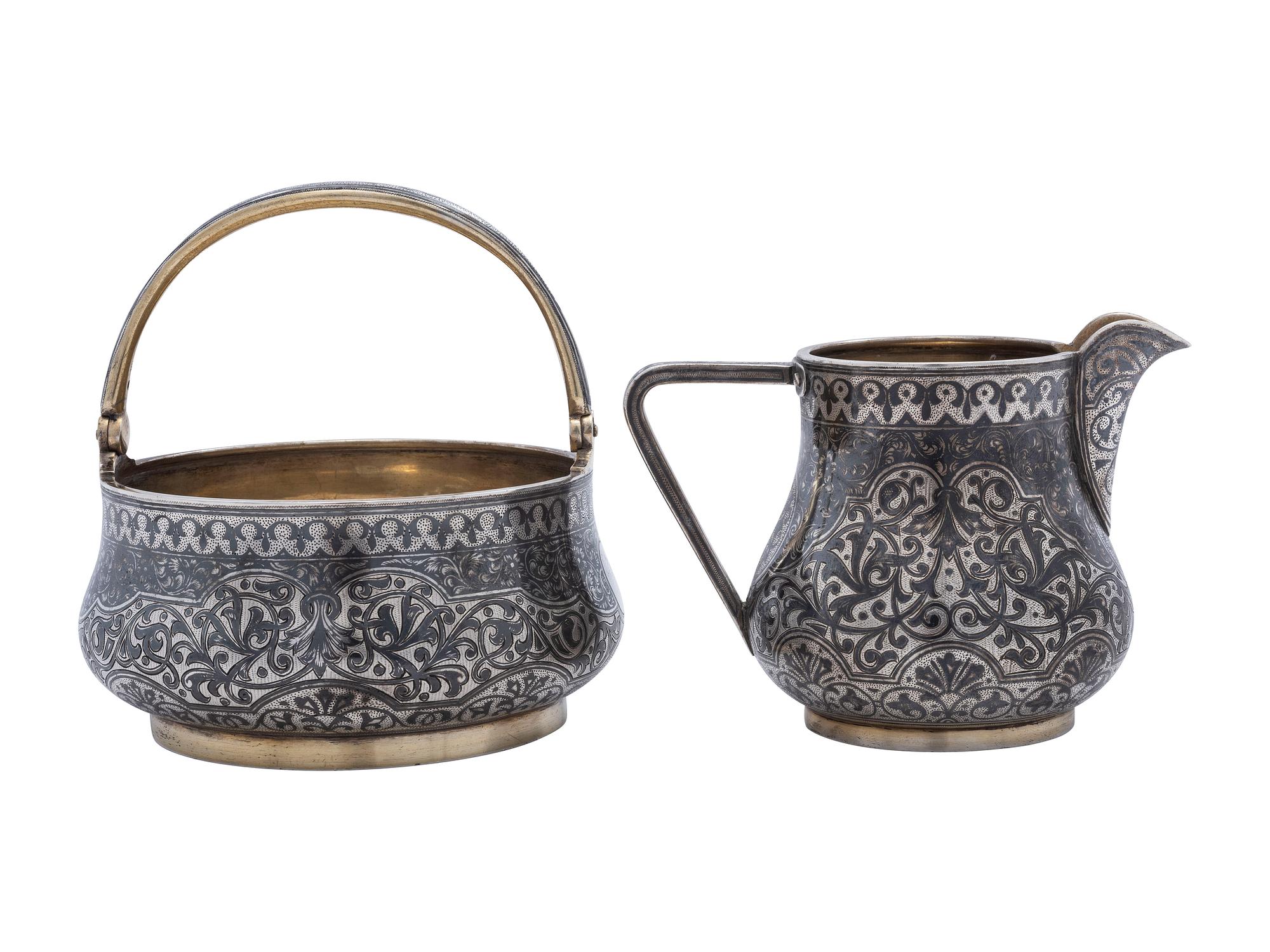 A Russian Niello Inlaid Silver Four-Piece Serving Set
