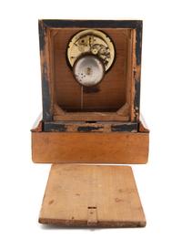 A Continental Maple and Gilt-Metal Mounted Mantel Clock