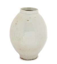 A Korean White Glazed Porcelain Storage Jar JOSEON DYNASTY, 18TH/19TH CENTURY Height 14 1/4 inches. — JOSEON DYNASTY, 18TH/19TH CENTURY