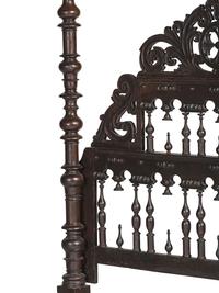 A Gothic Revival Walnut Four Poster Bed