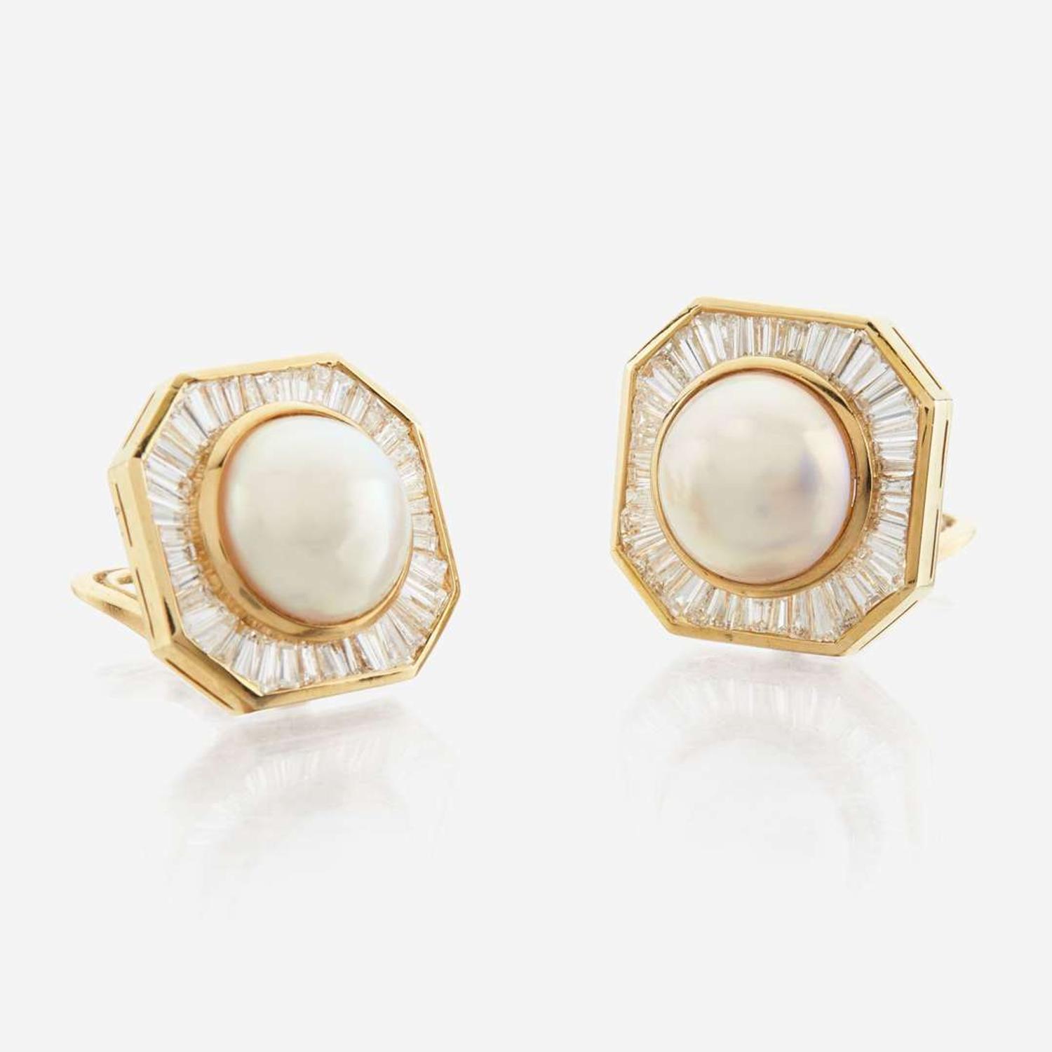 A pair of pearl, diamond and white gold earrings