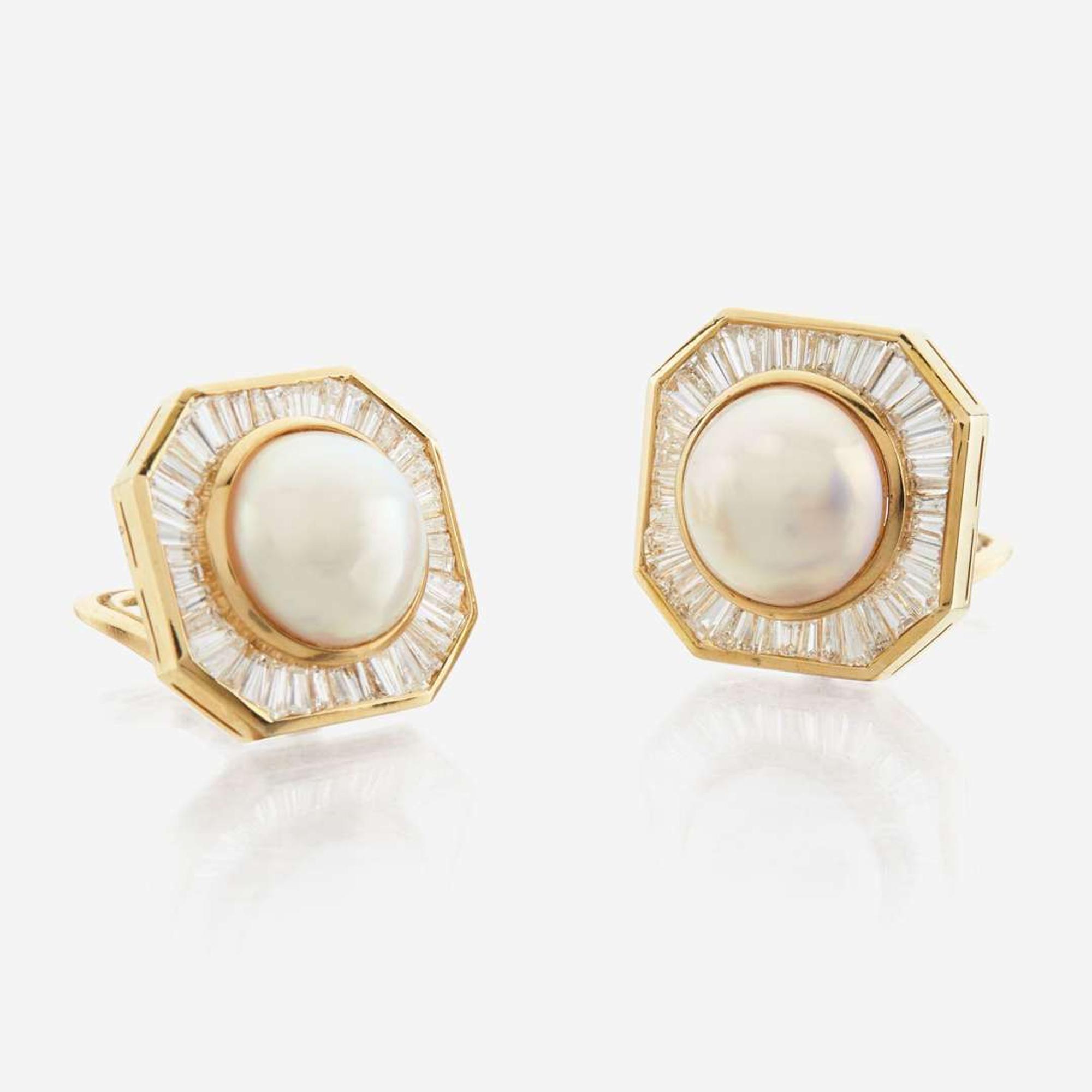 A pair of pearl, diamond and white gold earrings