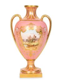 A Coalport Porcelain Pink-Glazed Urn