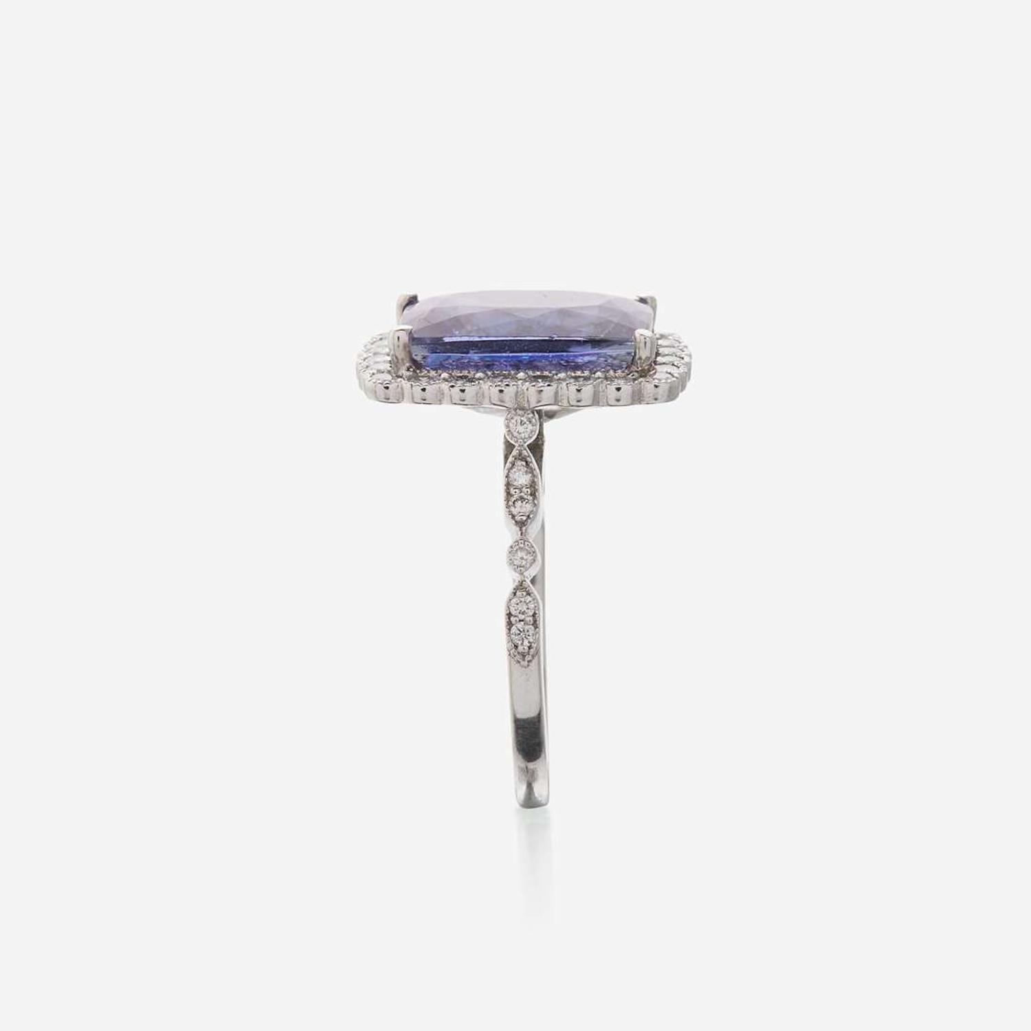 A tanzanite, diamond, and eighteen karat white gold ring