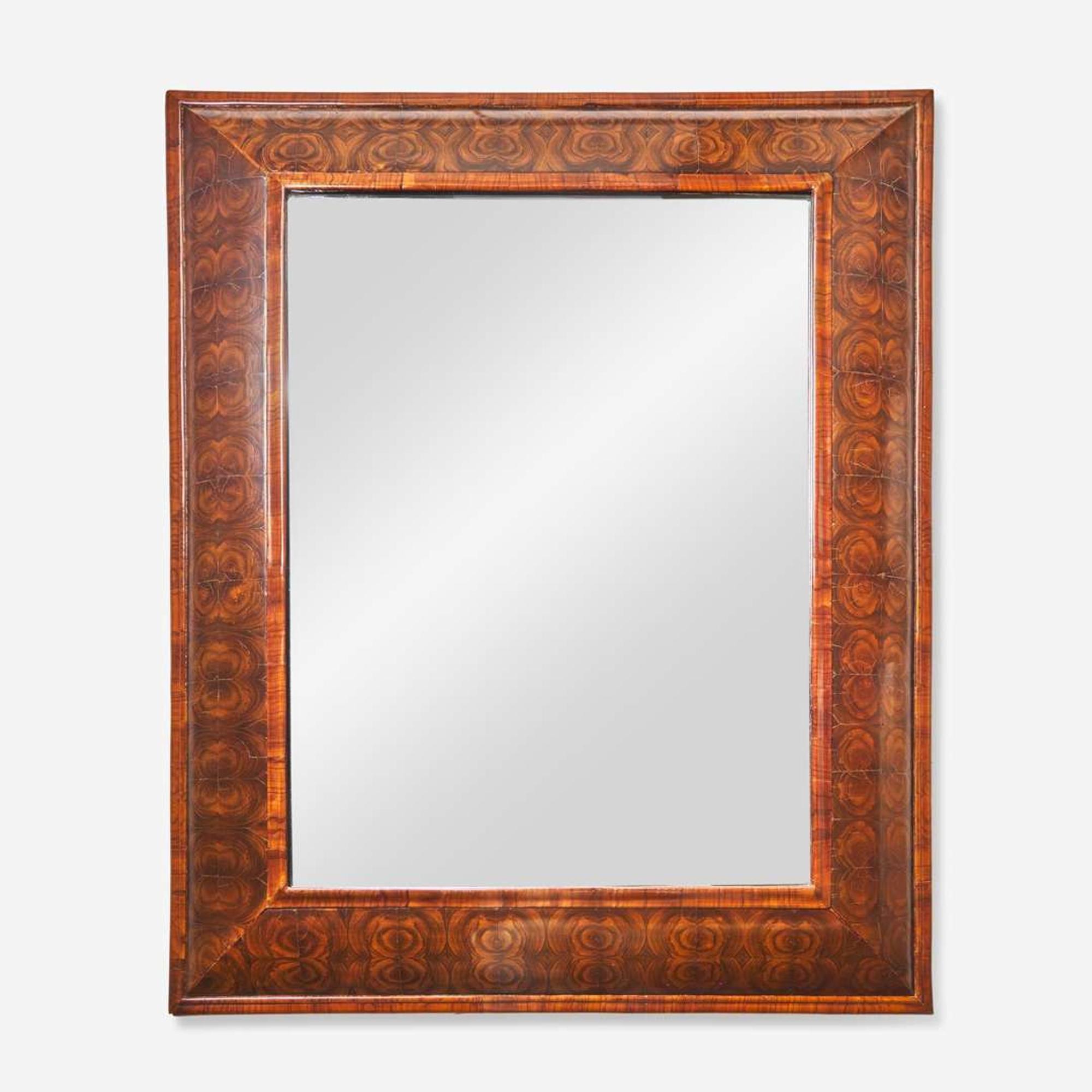 A William & Mary burl walnut veneered mirror early 18th century and later
