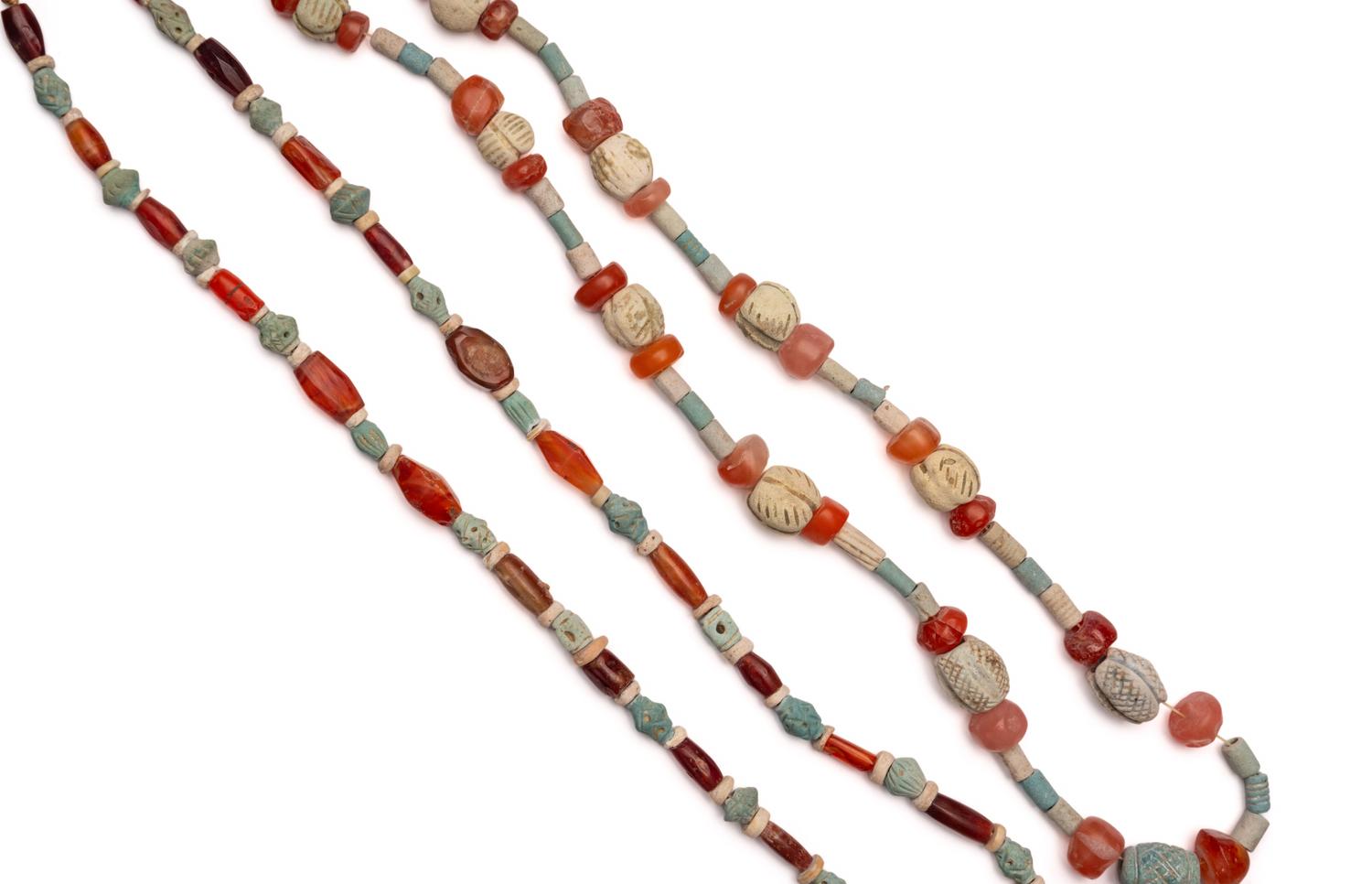 Two Near Eastern Carnelian and Faience Bead Necklaces