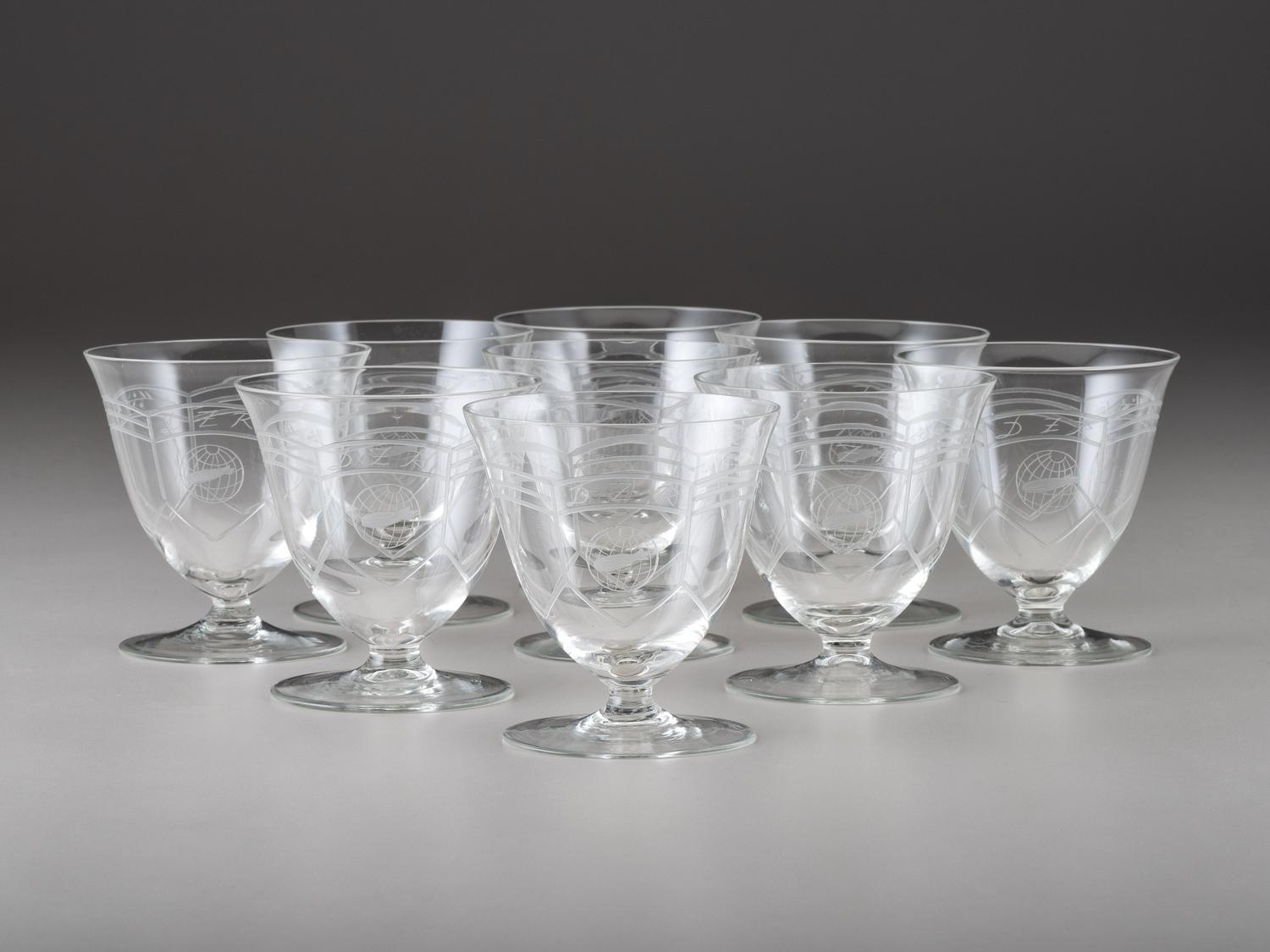 [TRANSPORTATION] - [ZEPPELIN]. Set of Deutsche Zeppelin-Reederei porcelain with dinner plates, salad plates, and sherbet glasses.