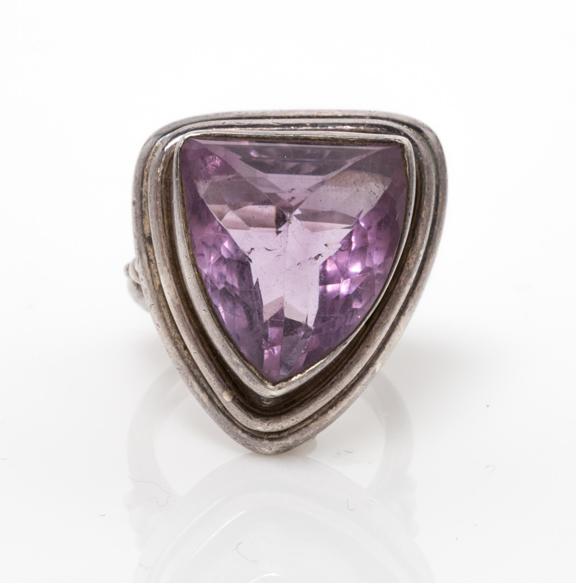 A Silver and Amethyst Ring, 12.20 dwts.