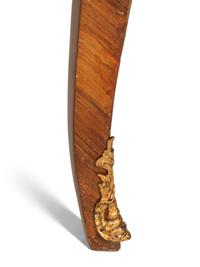 A Louis XV Style Gilt Bronze Mounted Tulipwood and Marquetry Extension Dining Table