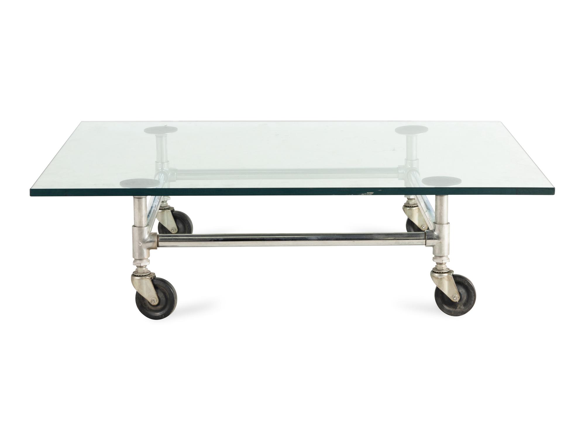 A Glass-Topped Steel Low Table