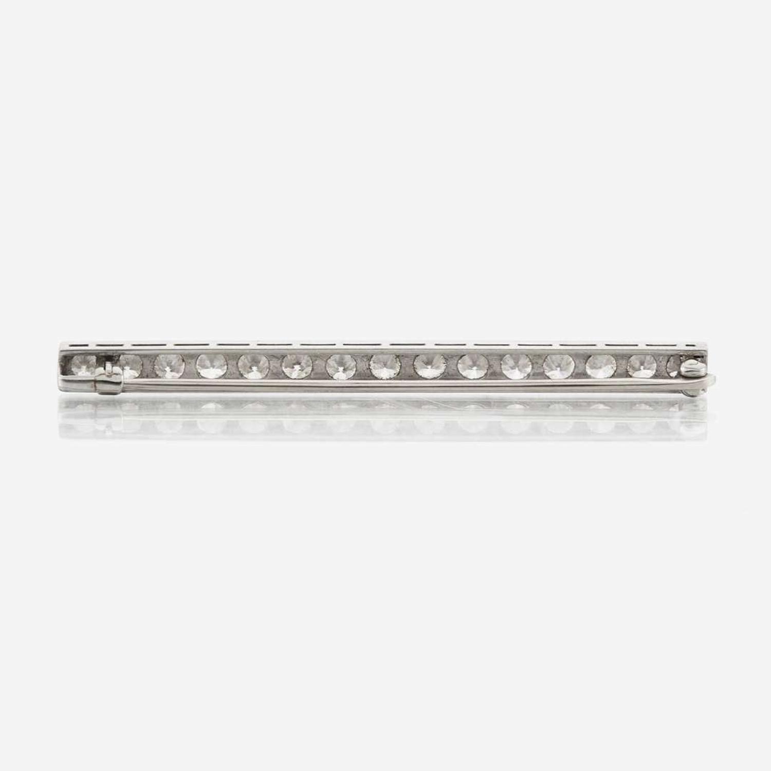 An antique diamond and platinum brooch