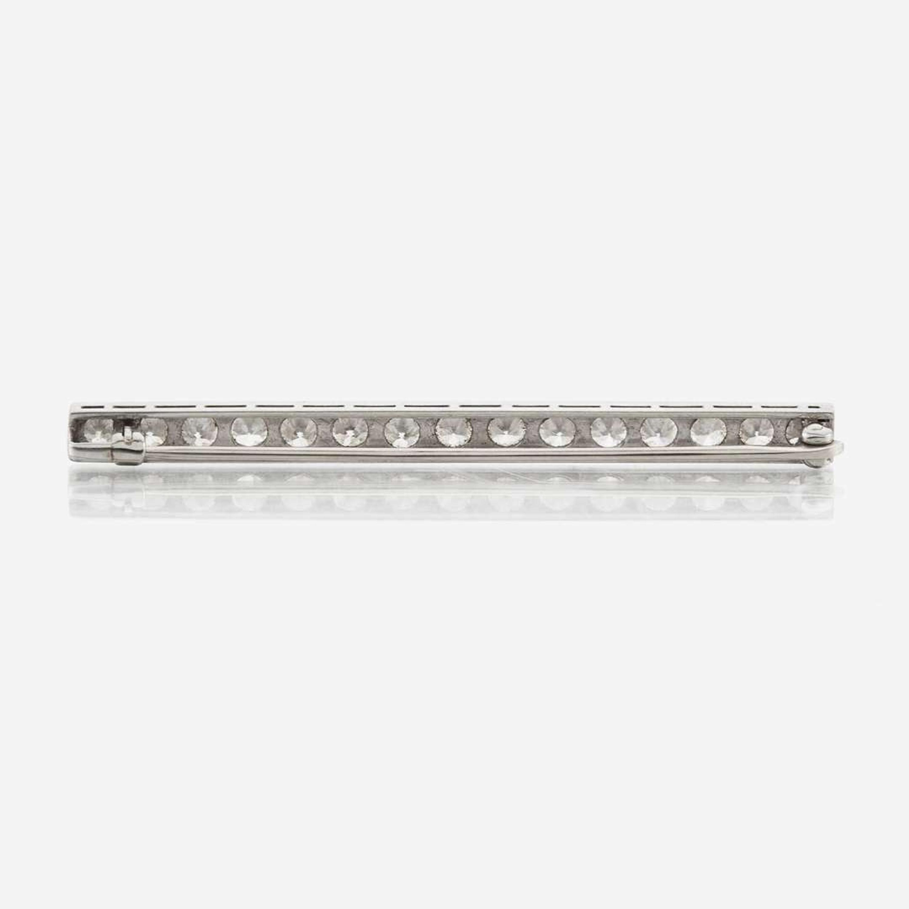 An antique diamond and platinum brooch