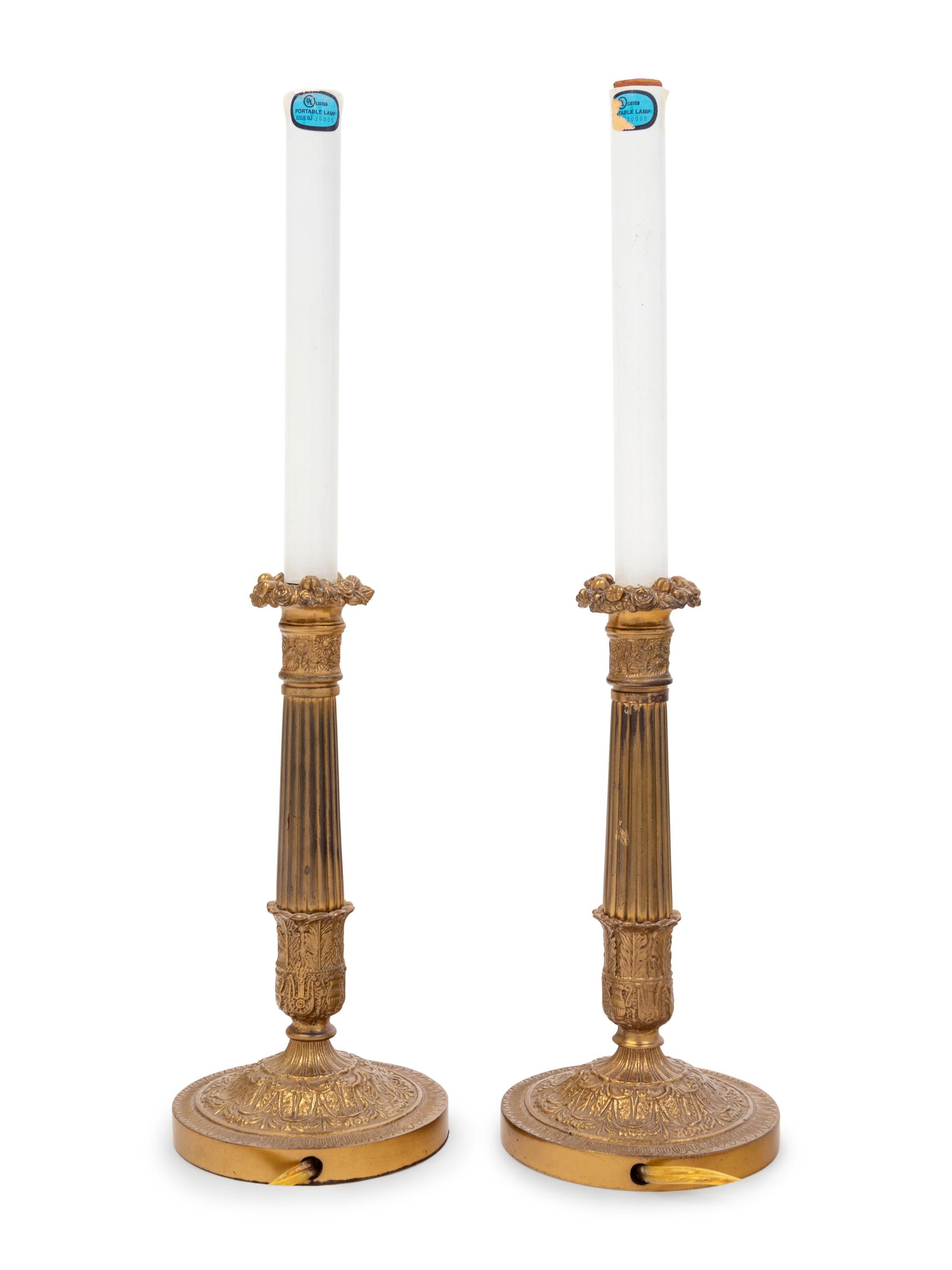 A Pair of French Gilt Metal Candlesticks Mounted as Lamps