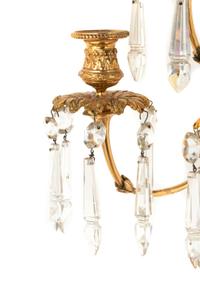 A Pair of Louis XVI Style Gilt Bronze and Cut Glass Nine-Light Sconces