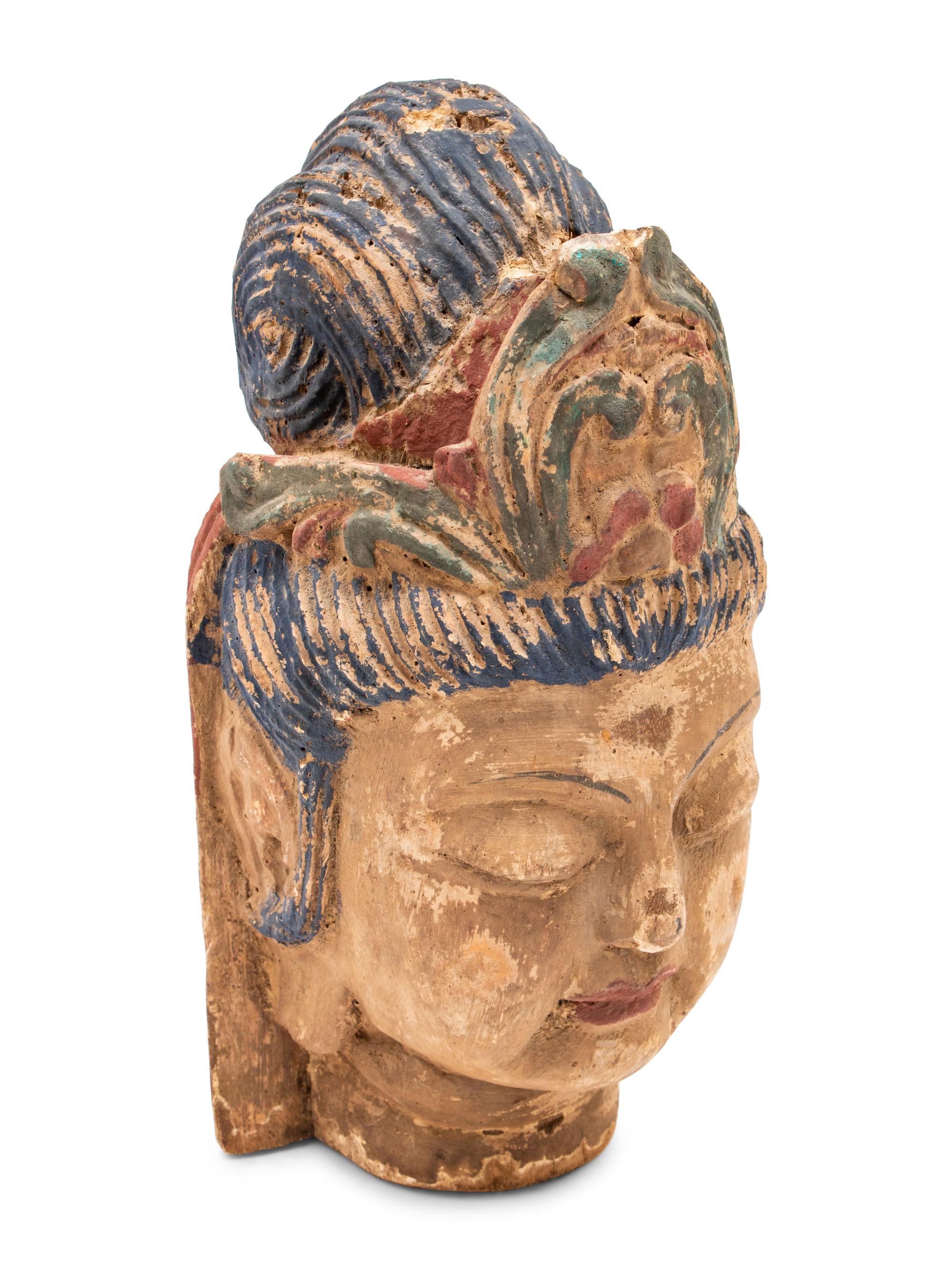 A Pair of Southeast Asian Deity Heads