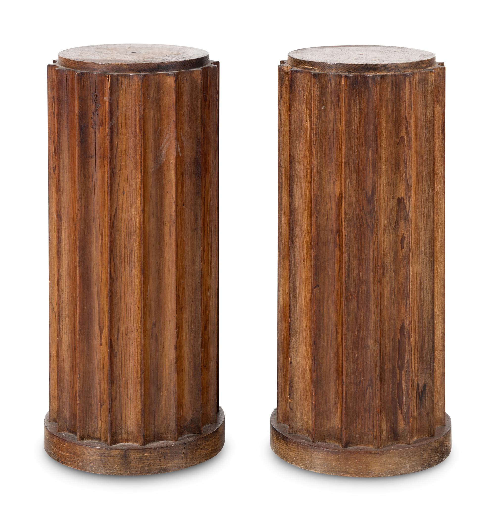 A Pair of Stained Pine Fluted Columnar Pedestals