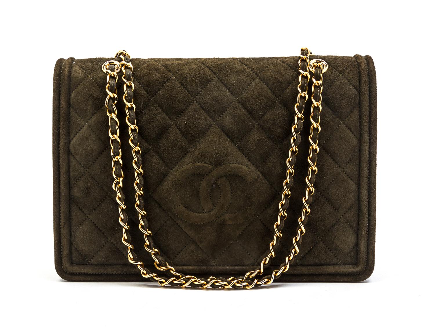 A Chanel Green Quilted Suede Flap Bag, 11 x 7 1/2 x 3 inches.