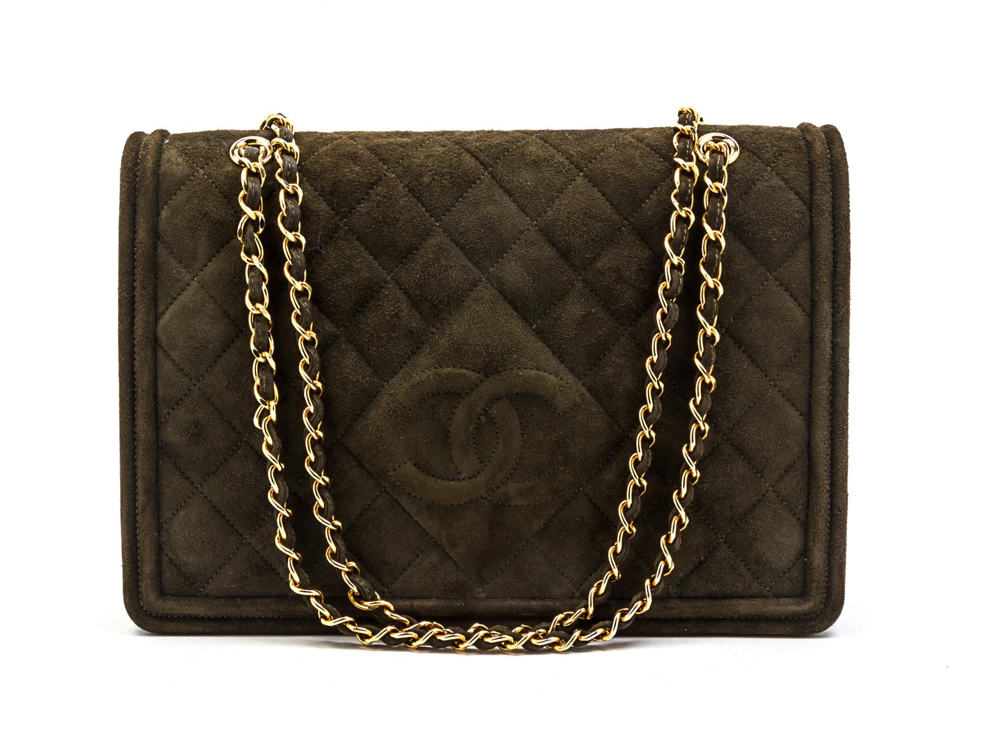A Chanel Green Quilted Suede Flap Bag, 11 x 7 1/2 x 3 inches.