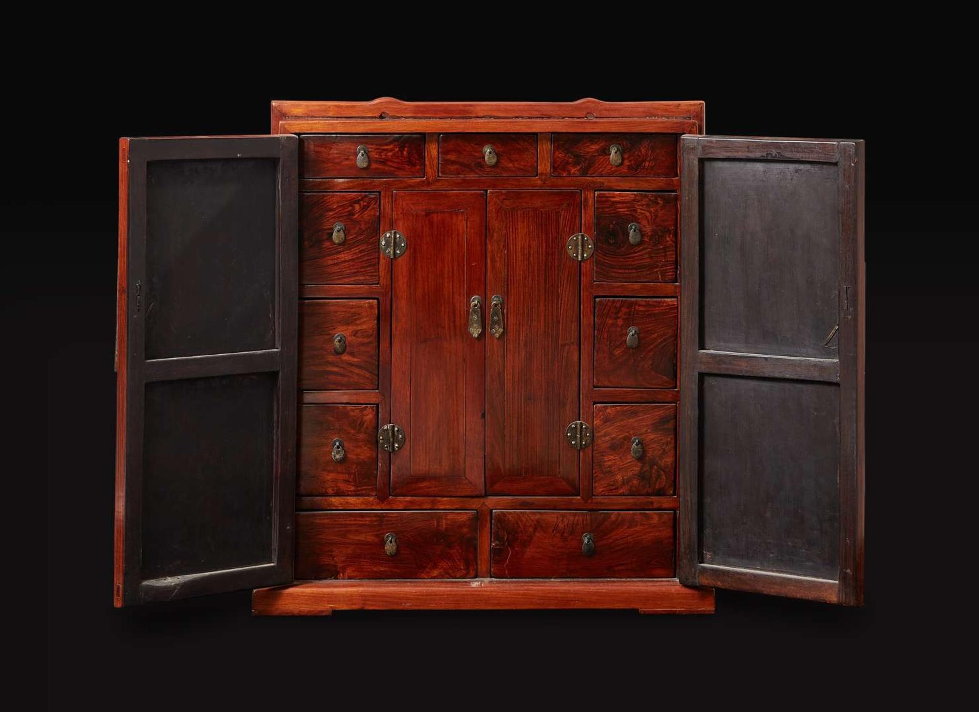A huanghuali, huamu and mixed hardwoods travelling cabinet 黃花梨樺木及硬木箱