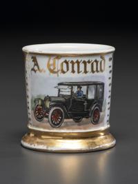 A Porcelain Shaving Mug Depicting an Automobile