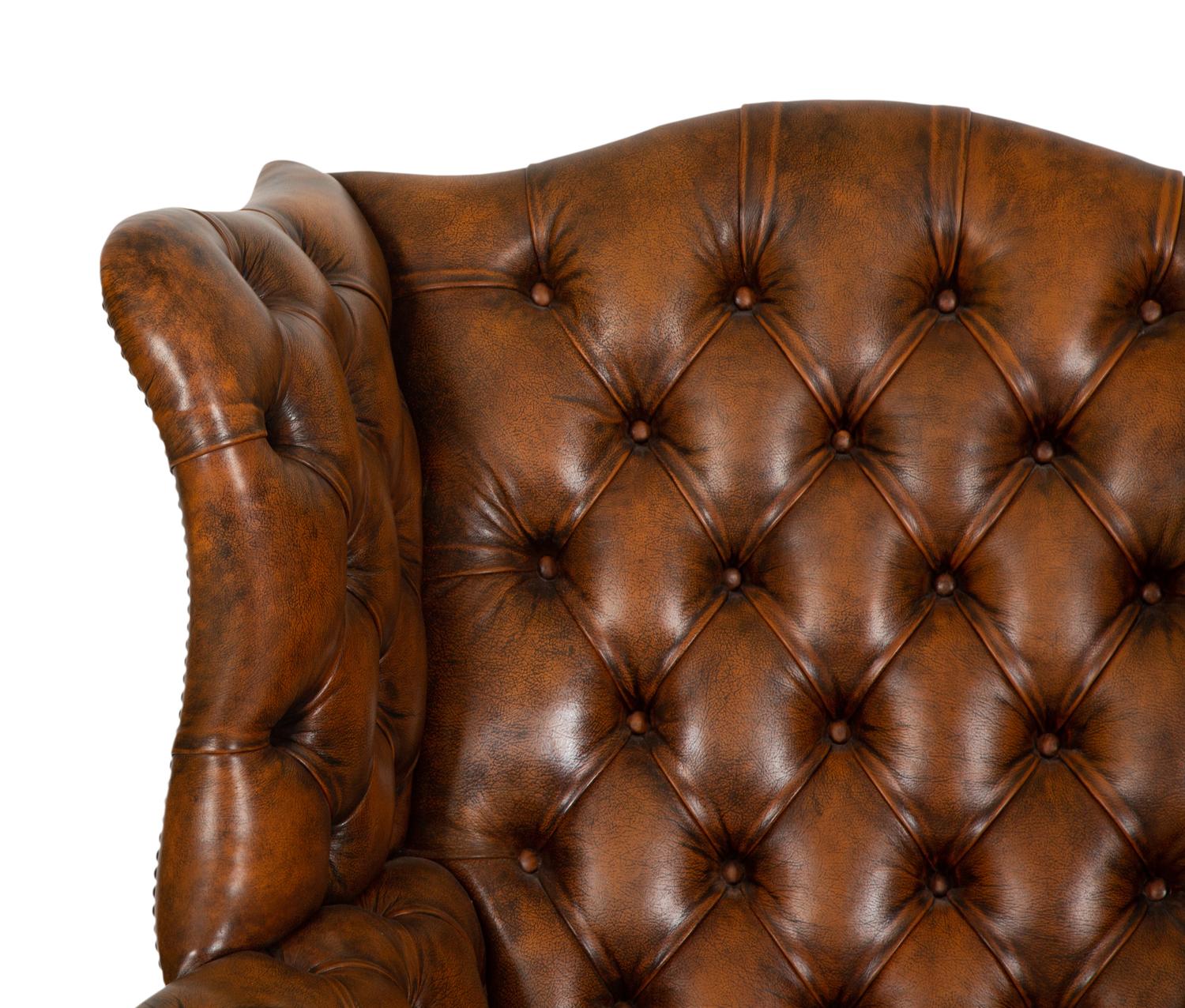 An English Leather-Upholstered Wingback Armchair