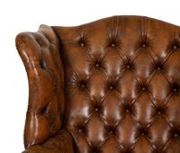 An English Leather-Upholstered Wingback Armchair