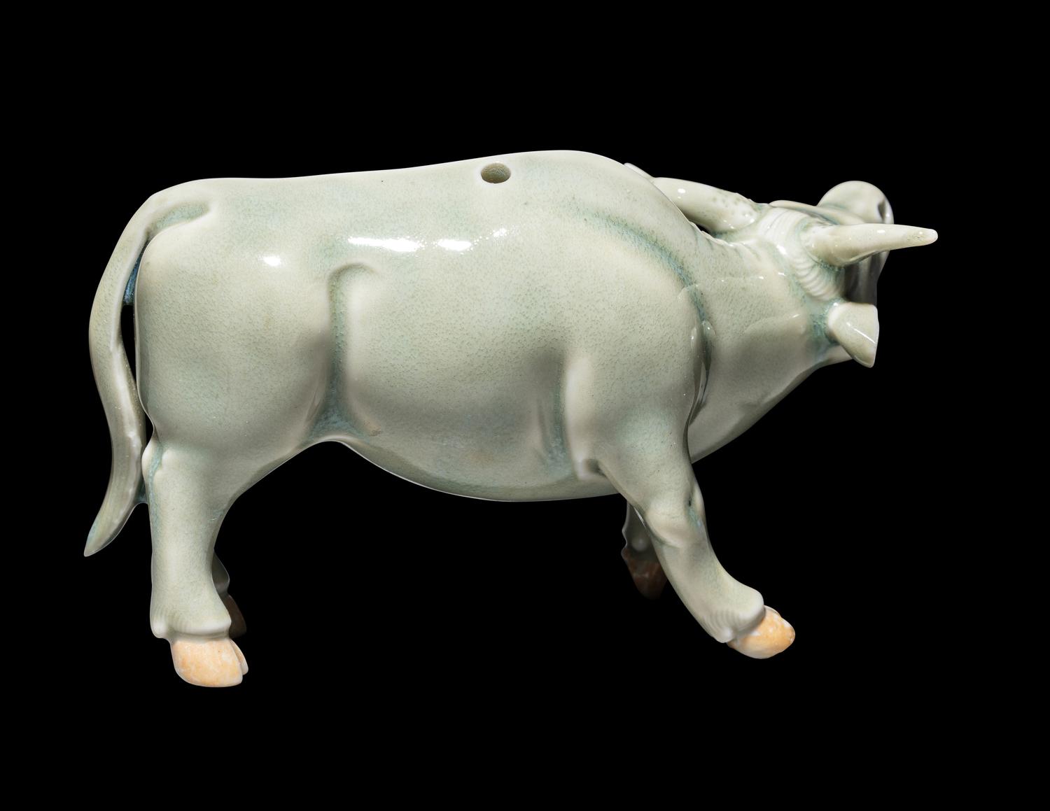 A Japanese Hirado Celadon Glazed Porcelain Water Buffalo-Form Water Dropper