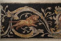 A Roman-Style Polychrome Mosaic Panel with a Bearded Head and Two Animals