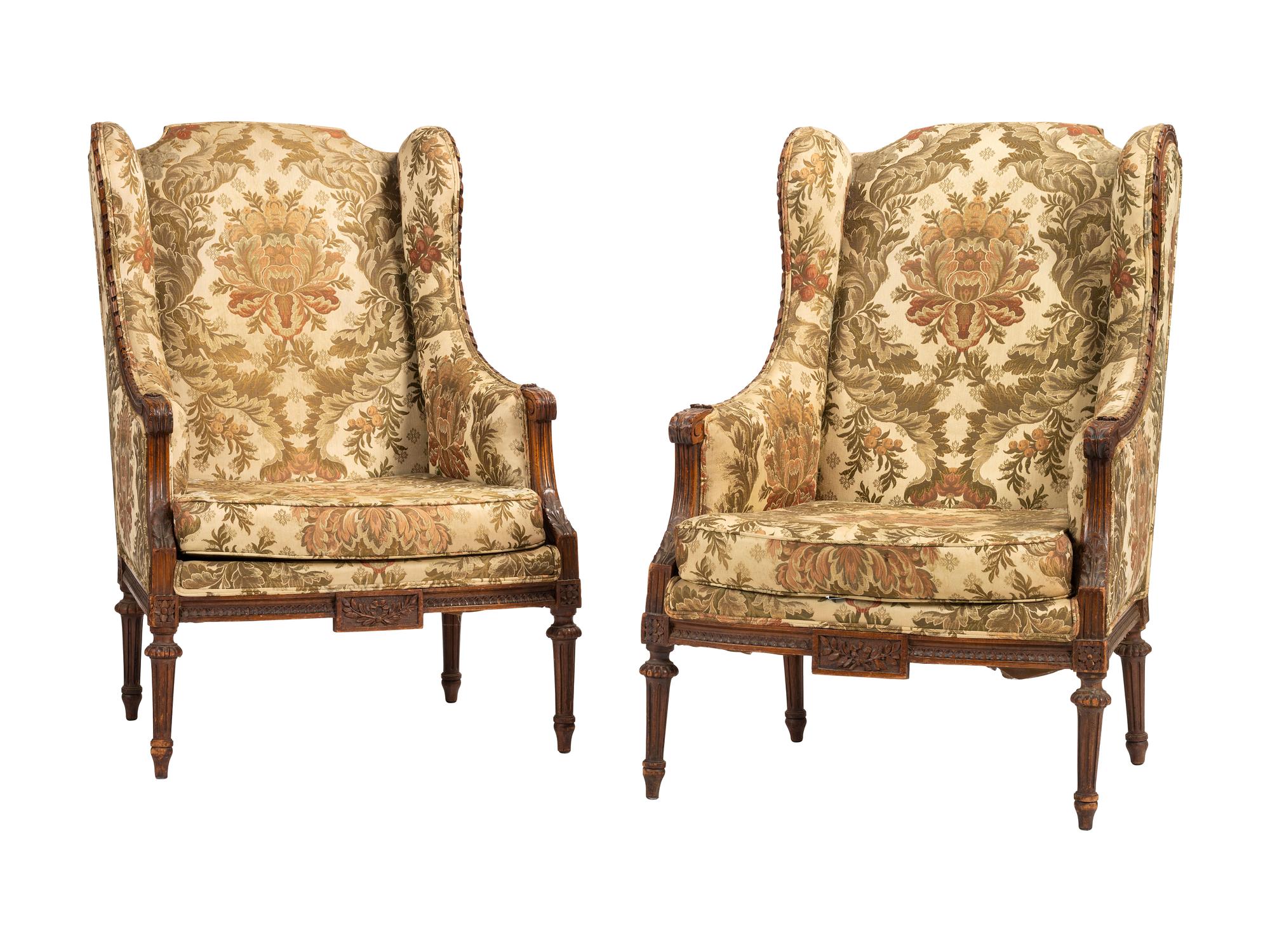 A Pair of French Louis XVI-style Walnut Bergeres
