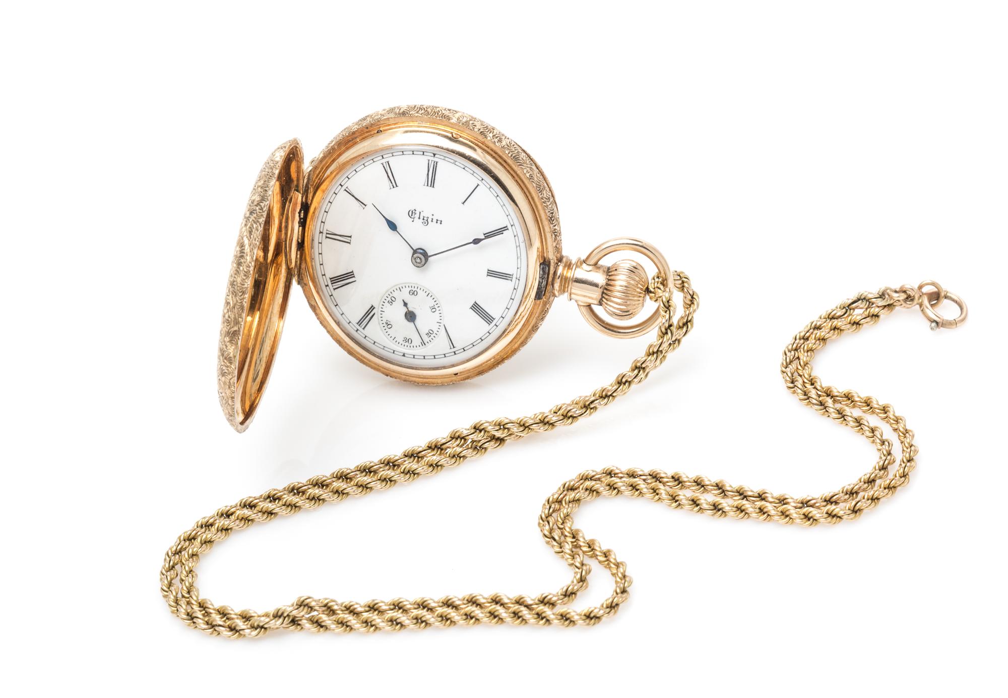 A 14 Karat Yellow Gold Hunter Case Pocket Watch with Chain, Elgin, Circa 1890, 32.20 dwts.