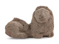 A Carved Granite Figure of a Reclining Lion — 19TH/20TH CENTURY