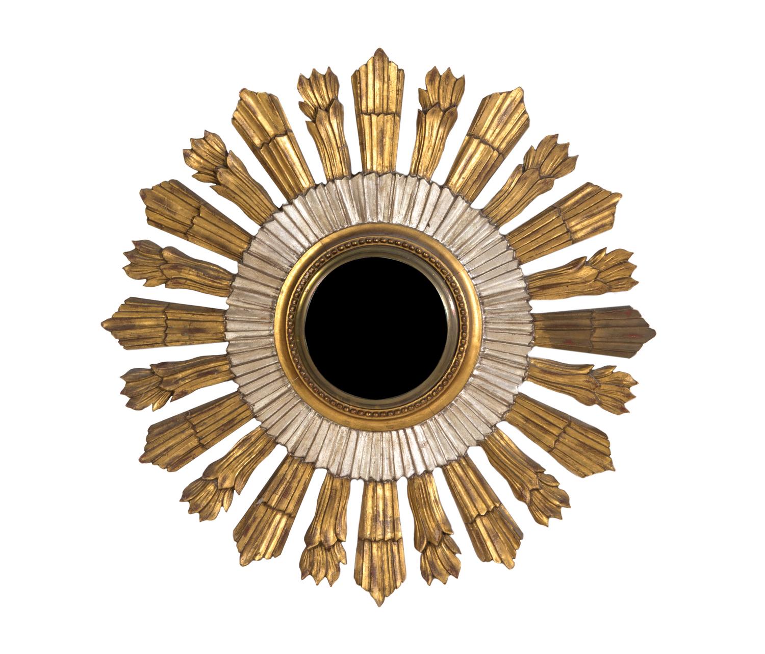 A Gilt and Silvered Wood Sunburst Mirror, Diameter 29 3/4 inches.