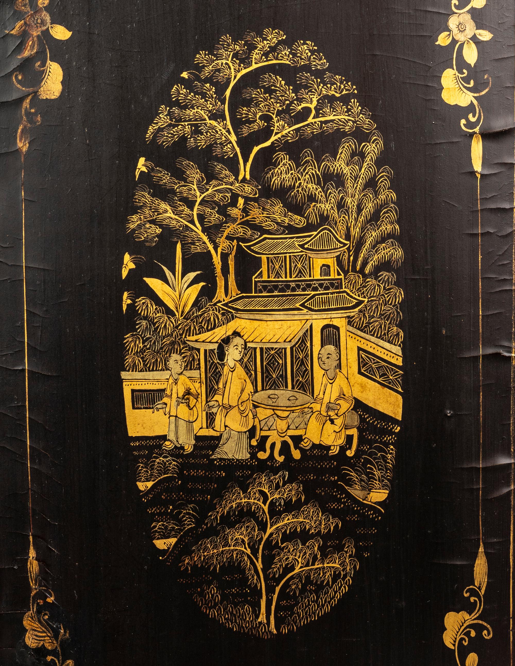 A Chinese Export Gilt Decorated Black Lacquered Chest
