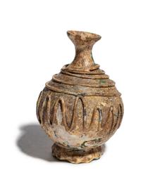 A Late Roman or Islamic Glass Bottle