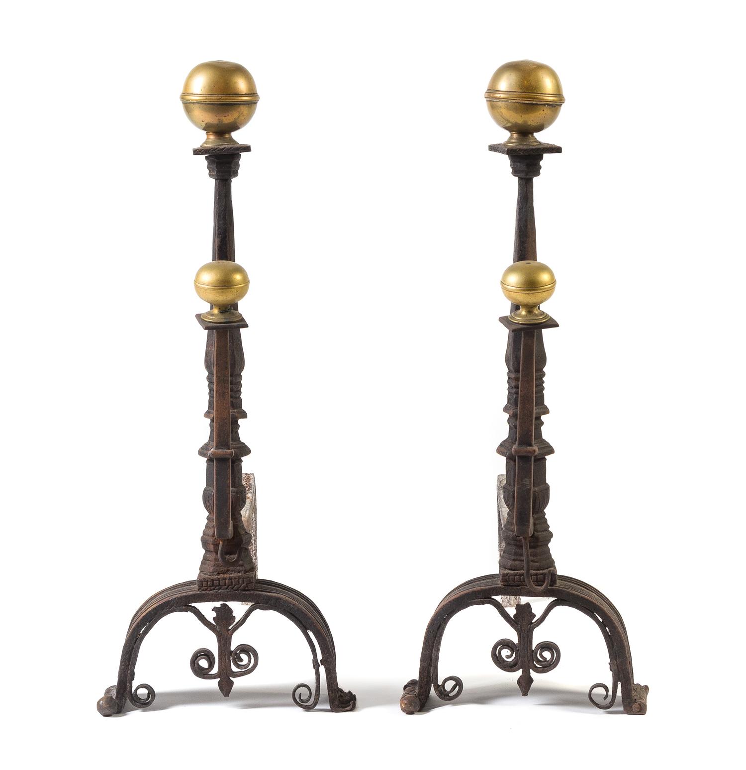 A Pair of Italian Baroque Brass and Iron Andirons Height 30 inches. — LATE 15TH CENTURY