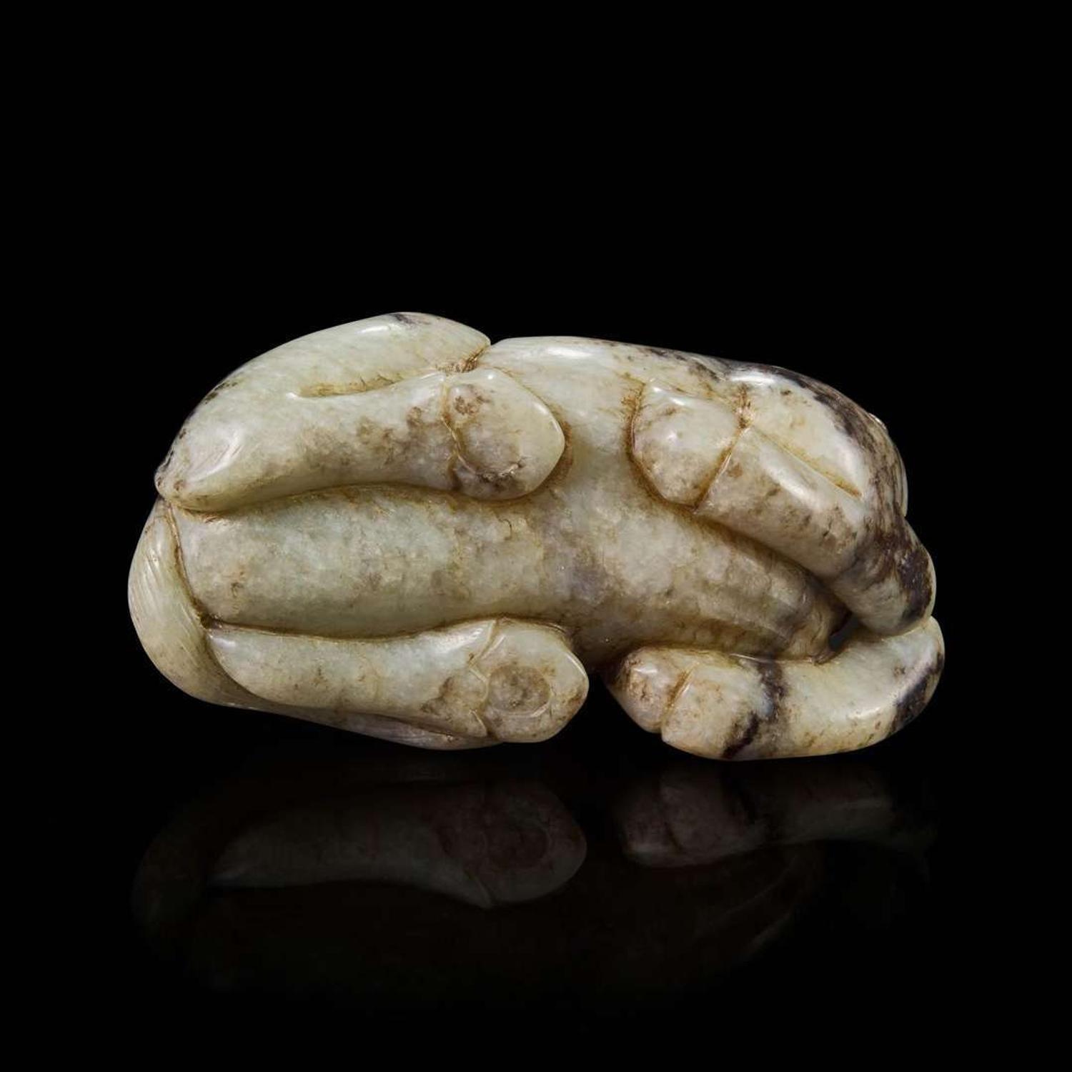 A Chinese jade carving of a recumbent horse 玉雕卧马 Ming dynasty-early Qing dynasty ????