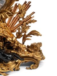 A French Gilt and Patinated Bronze Pendule à la Gloire du Roi
