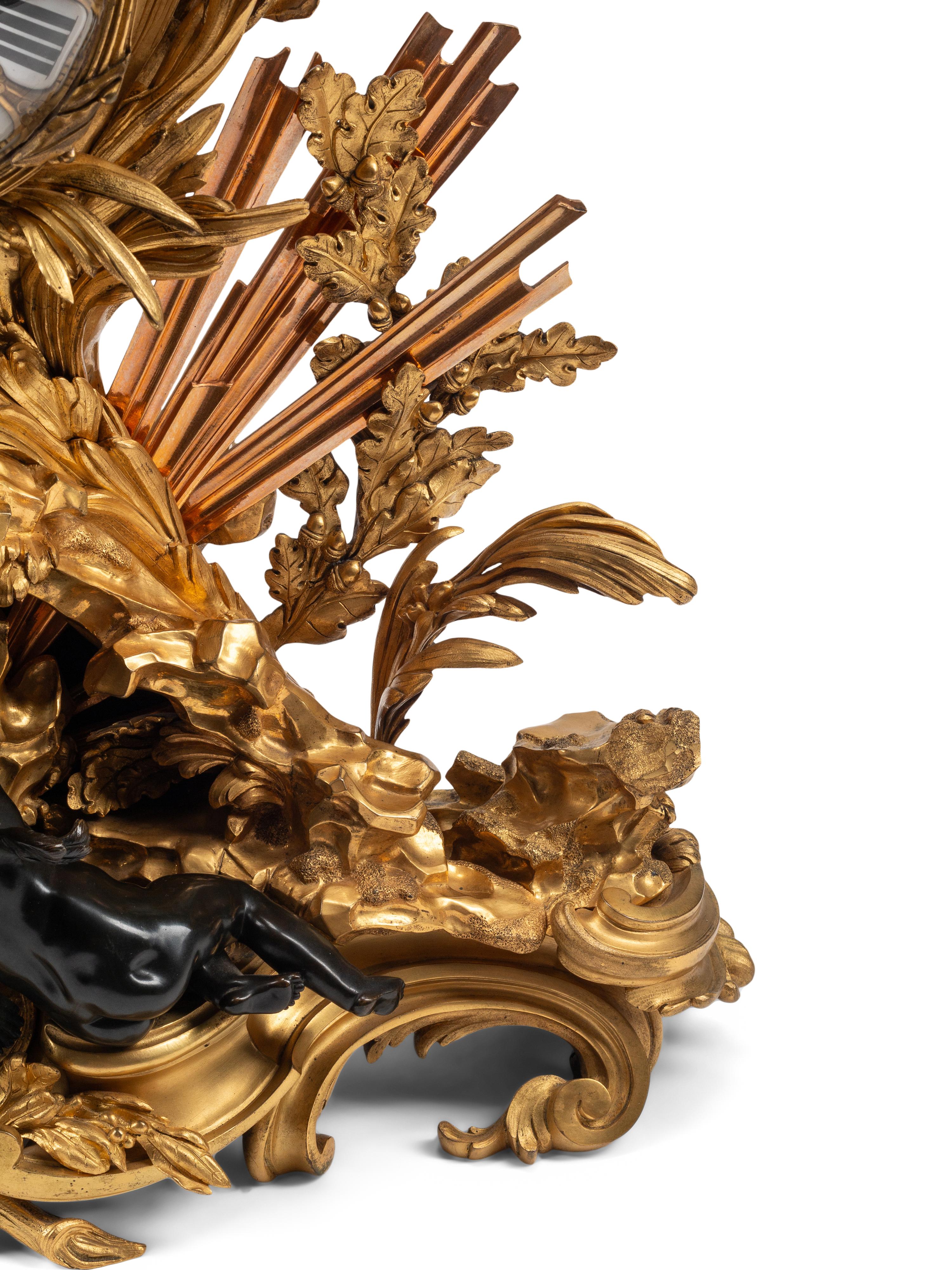 A French Gilt and Patinated Bronze Pendule à la Gloire du Roi
