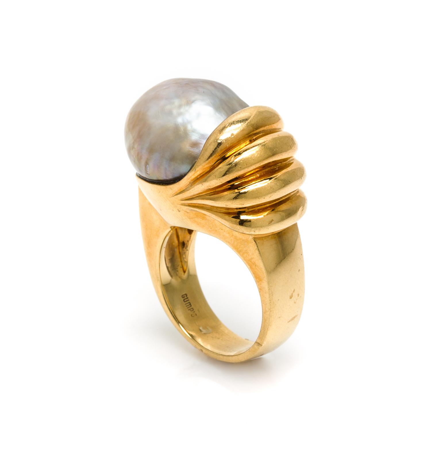 An 18 Karat Yellow Gold and Cultured Pearl Ring, Gump's, 16.30 dwts.