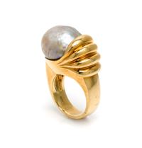 An 18 Karat Yellow Gold and Cultured Pearl Ring, Gump's, 16.30 dwts.