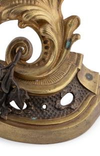 Three Rococo Style Gilt and Patinated Bronze Fireplace Articles