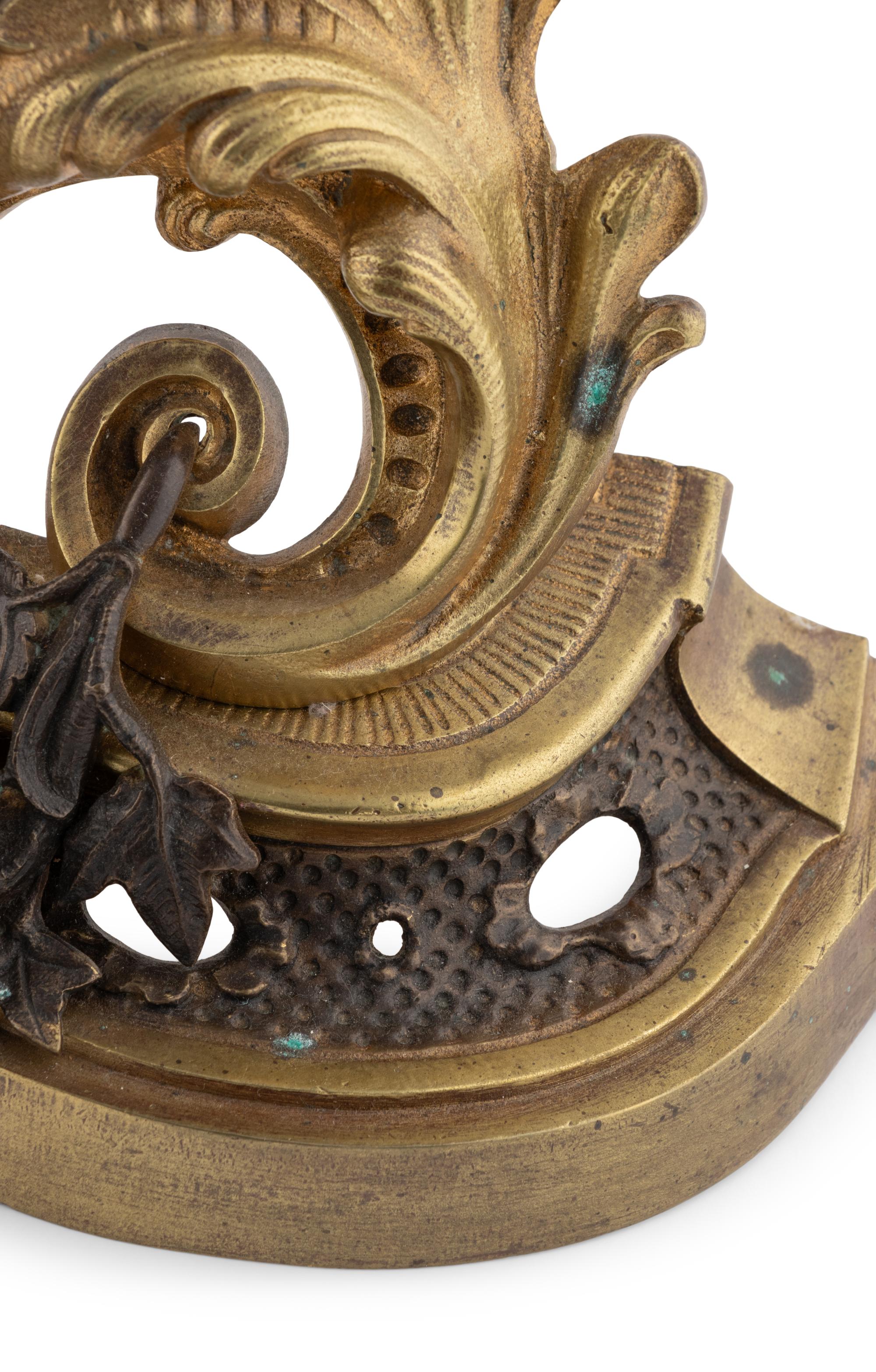 Three Rococo Style Gilt and Patinated Bronze Fireplace Articles