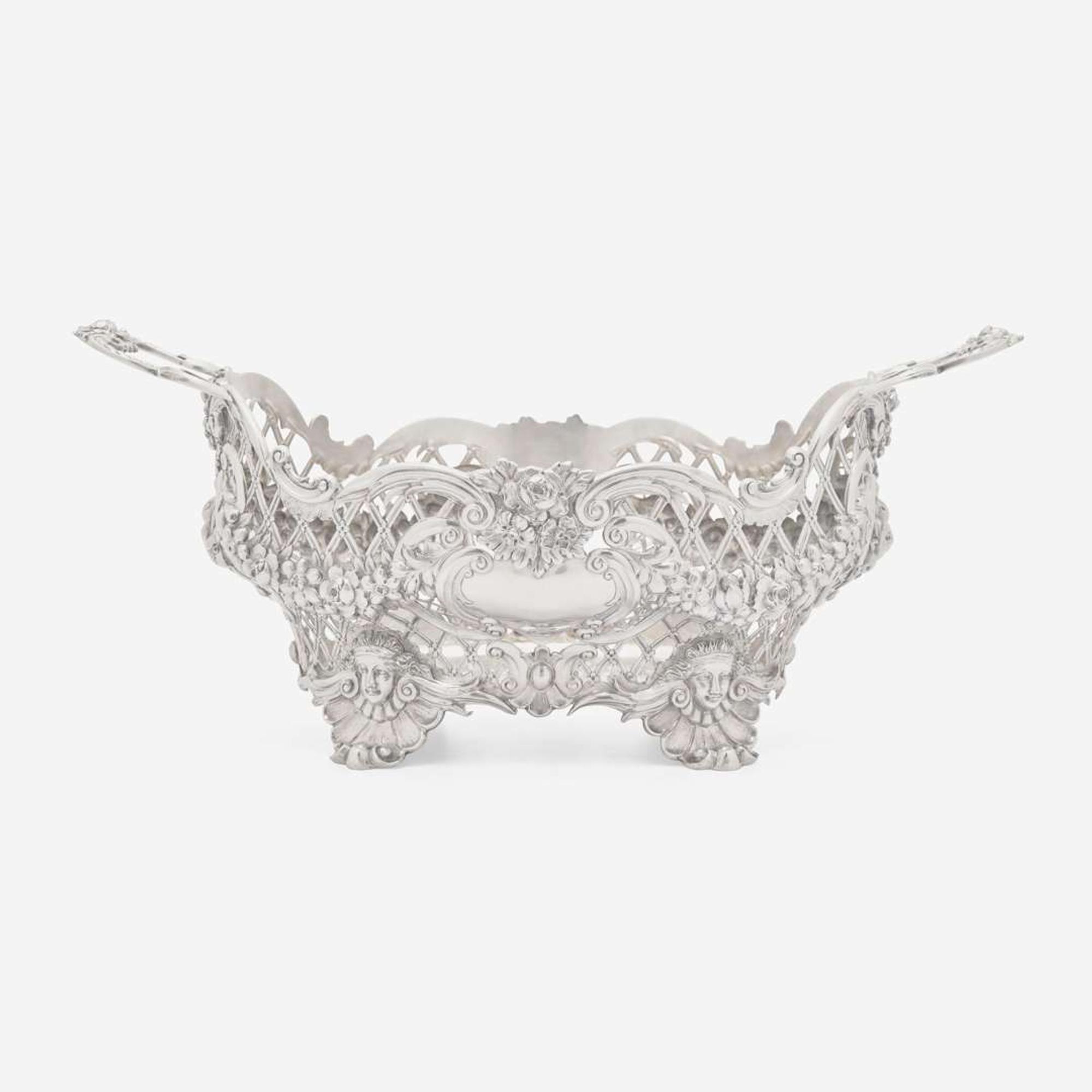 An Edward VII sterling silver reticulated centerpiece basket Maker, "HB," London, 1902