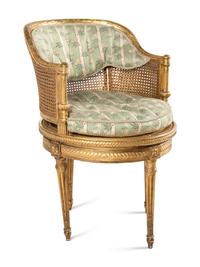 A Louis XVI Style Giltwood Bureau Bergère