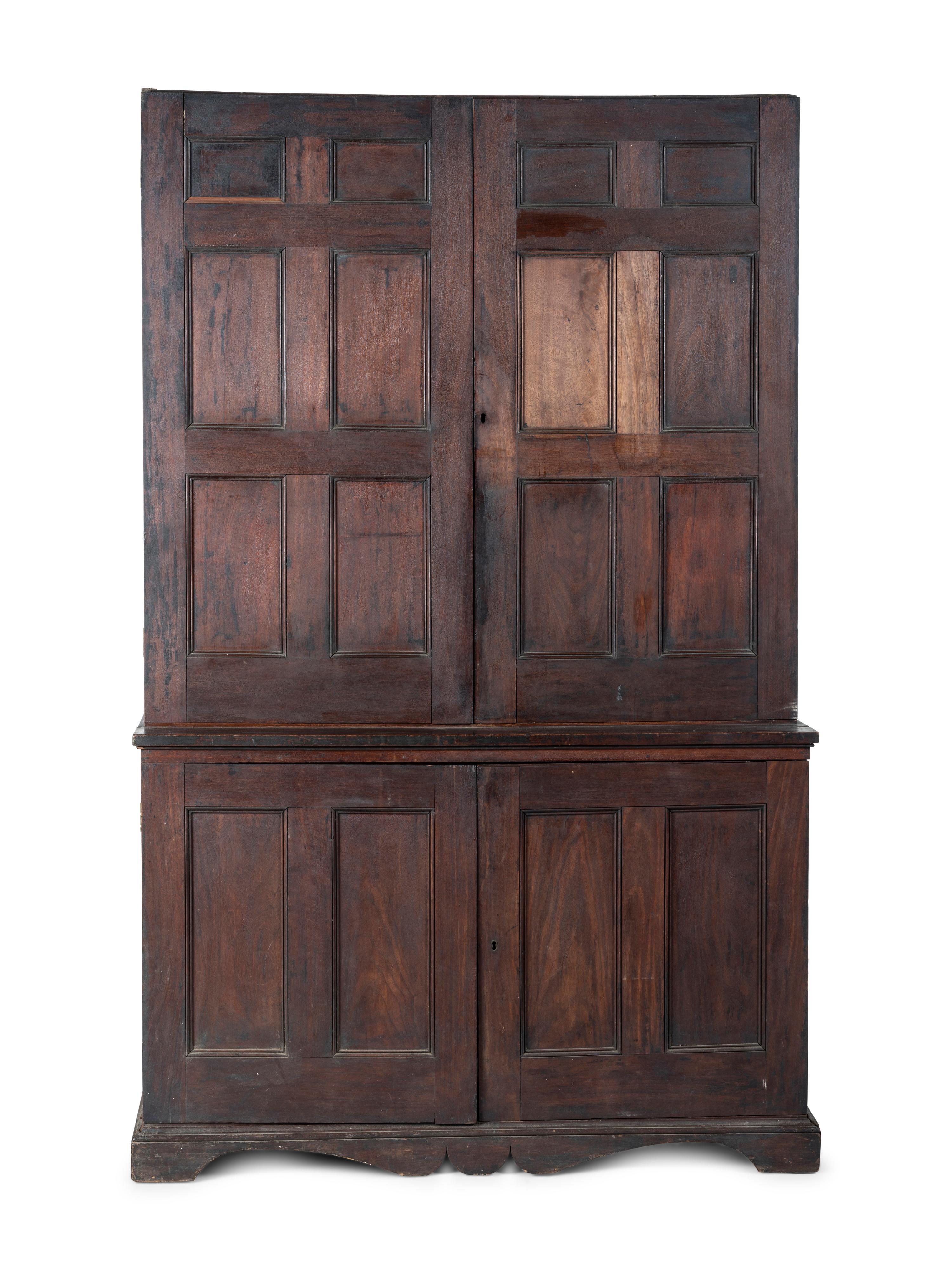 A Chippendale Style Walnut Paneled Step Back Cupboard